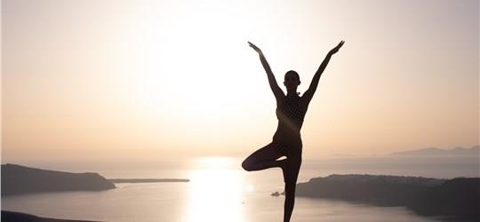 Photo of Unwind on a Sunbed with Infinity Pool Access and Stunning Caldera Views