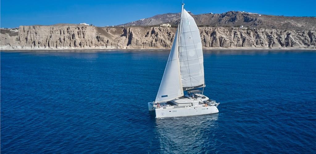 Photo of Classic Catamaran Cruise in Santorini with Food & Drinks
