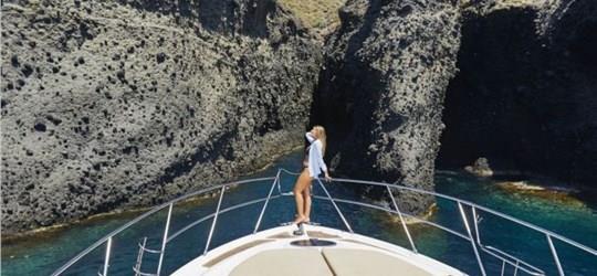 Photo of Luxury Private Yacht Tour of Santorini's Shoreline with Meal and Drinks