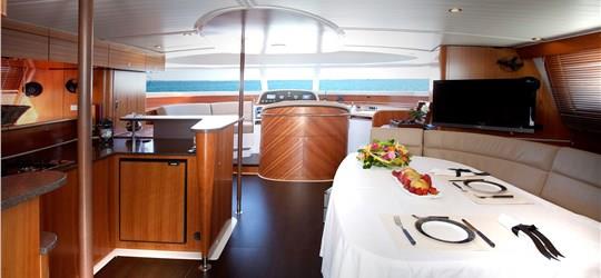 Photo of Private Power Catamaran Cruise in Santorini with BBQ and Drinks