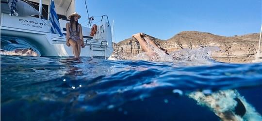 Photo of Small-Group Catamaran Cruise with BBQ Fresh Fish/Seafood Meal & Drinks