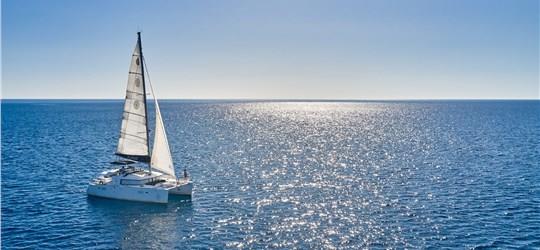 Photo of Classic Catamaran Cruise in Santorini with Food & Drinks