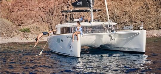 Photo of Small-Group Catamaran Cruise with BBQ Fresh Fish/Seafood Meal & Drinks