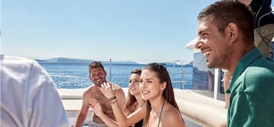 Photo of Luxurious Catamaran Cruise in Santorini with BBQ and Drinks