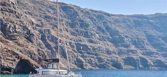 Photo of Classic Catamaran Cruise in Santorini with Food & Drinks