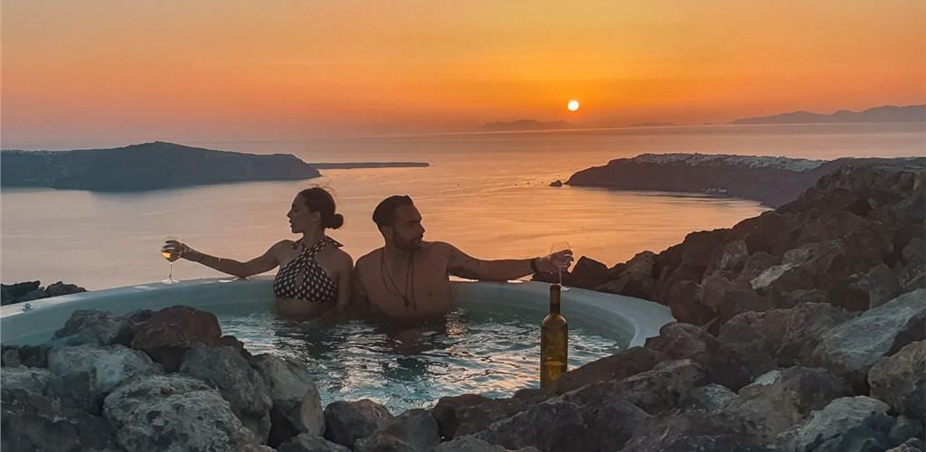 Photo of Luxurious Volcanic Hot Tub Experience Overlooking Santorini's Caldera