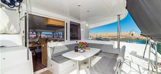 Photo of Private Catamaran Trip through Caldera's Wonders with Meal & Drinks included