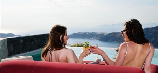 Photo of Unwind on a Sunbed with Infinity Pool Access and Stunning Caldera Views